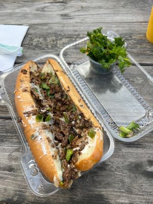 Philly Cheesesteak with Kale salad  at Karelyns Vegan Soul Café in Orlando
