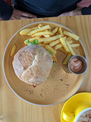 Burger and fries at Bosque Urbano in San Jose