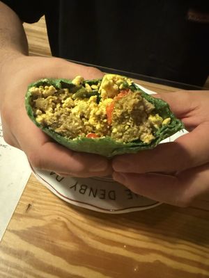 Vegan breakfast burrito - tofu scramble, plant based sausage and peppers. Huge burritos, very filling and good!!  at The Coffee Factory in Muskegon