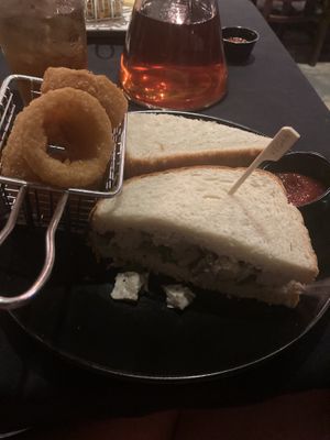 Chicken salad sandwich with onion rings at Craft 850 in Panama City Beach