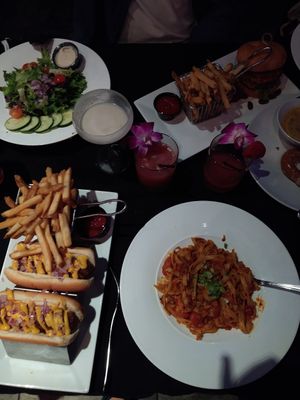 Vegan brats, bolognase  (I think I spelled that wrong lol), cowboy burger, and halfway cut off is the buvarian pretzel with vegan beer cheese! at Craft 850 in Panama City Beach
