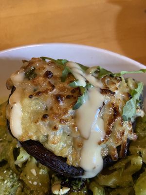 Portobello mushrooms stuffed with spinach risotto and vegan mozzarella.  at Norwood's Restaurant & Treehouse Bar in New Smyrna Beach