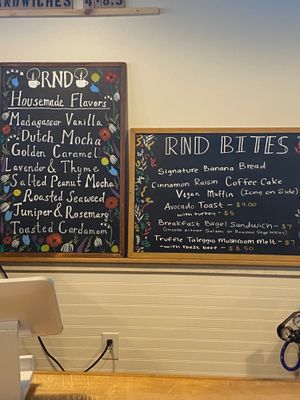 Latte flavors on the left and full menu of food items on the right  at RND Coffee Lounge in Roanoke