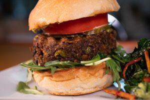 House made superfood veggie burger. Too many great ingredients to list. Served with chips or substitute a cup of soup or salad.  at Buena Onda Cafe in St Augustine