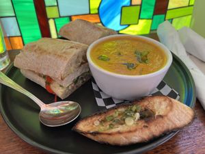 Tofu banh mi with tomato/sweet potato/coconut soup  at Buena Onda Cafe in St Augustine