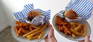 Shared each type of fries- highly recommend, both delicious! (shows burnt bun too) at The Hangry Vegan in Leighton Buzzard