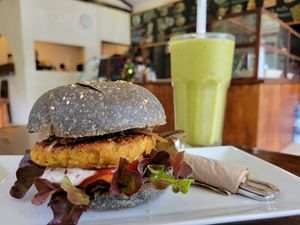 Vegan burger and a green smoothie at Nang Sabai Cafe Artisan Bakery in Koh Samui
