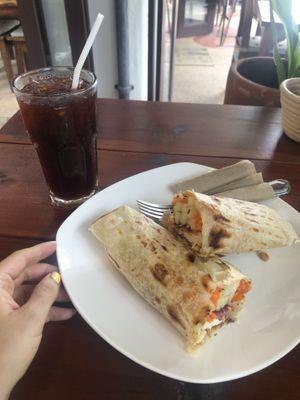 Coconut Iced Americano + Tofu Wrap  at Nang Sabai Cafe Artisan Bakery in Koh Samui