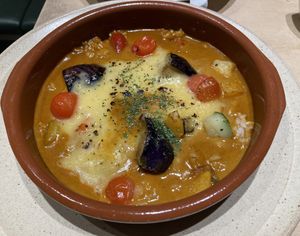 Curry rice with vegan cheese  at Vegan Bistro Jangara in Tokyo