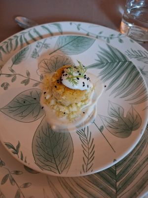 Millet and bell pepper croquette on a bed of crunchy fennel with vegan yogurt sauce. at Lucato Home Restaurant in Montorso Vicentino