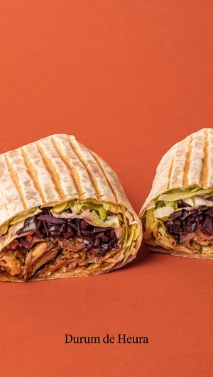 Heura marinated in a wheat wrap with pickled cabbage, lettuce, cucumber, onion and piparra. With soy yogurt sauce and hot sauce. at Good Shit, Vegan Kebabs in Barcelona