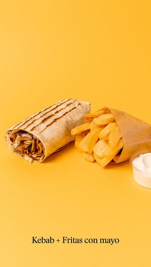 A kebab of your choice and a portion of fries with mayo. at Good Shit, Vegan Kebabs in Barcelona