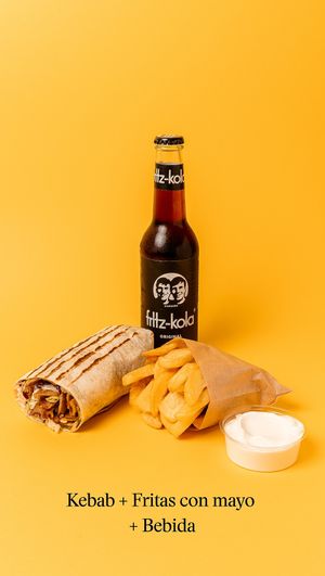 A kebab of your choice, a portion of fries with mayo and a drink of your choice. at Good Shit, Vegan Kebabs in Barcelona