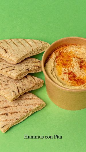 Homemade hummus with a pita bread. at Good Shit, Vegan Kebabs in Barcelona