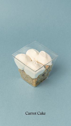 Homemade vegan carrot cake in a tub from CUVO Foods at Good Shit, Vegan Kebabs in Barcelona