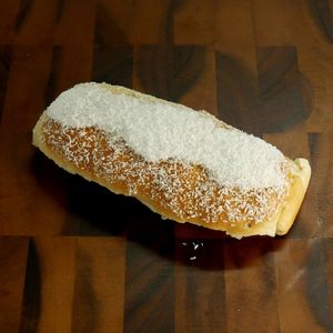 Coconut Finger Bun at Bradleys Bakery - Christie Downs in Adelaide