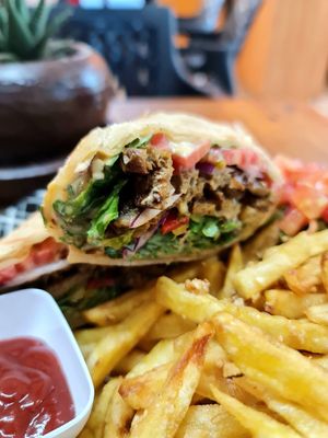 Seitan gyro with garlic fries. at Soul Veg(etária)  in Nairobi