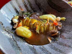 Soba noodles in a dark soy glaze  at NaRa-Ya in Washington