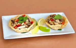 Sopes de Champiñiones:
corn tortilla sope topped with refried beans & garlic mushrooms. at El Tamarindo in Washington