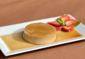 Flan de Vainilla. 
Coconut-cream-based, velvety flan with a hint of vanilla & cinnamon.  at El Tamarindo in Washington
