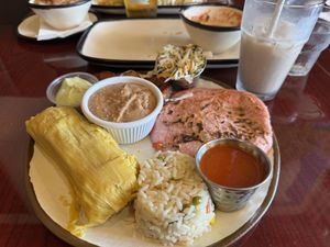Combo plate w vegan pupusa, corn tamal, rice, bean, plantains  at El Tamarindo in Washington
