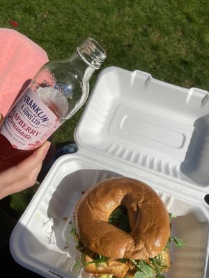Smoked Tofu & Avocado Bagel w/ ethically sourced raspberry lemonade. at Copper and Moss in Shipley