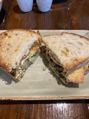 Smoked marinated tofu and smashed avo, pickled mushrooms, crispy shallots and homemade tahini dressing served in toasted sourdough at Copper and Moss in Shipley