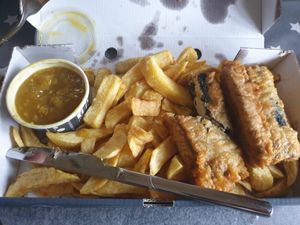 Tofish and chips meal, with curry sauce at Golds Fish Chips & Vegan in Catshill