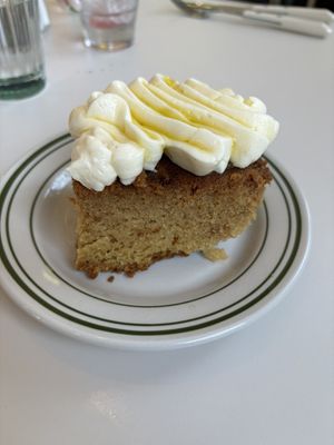 Olive oil cake with a very sweet buttercream. Would have been great with some citrus. As it was it only had a sweet flavour and wasn’t exciting.   at Stefano's Diner in Toronto