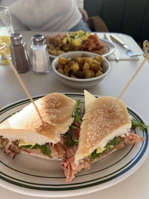 Italian sub, fried potatoes, benny in the back  at Stefano's Diner in Toronto