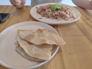 Quinoa salad and something like a Naa bread at Tierra & Luna in Villahermosa