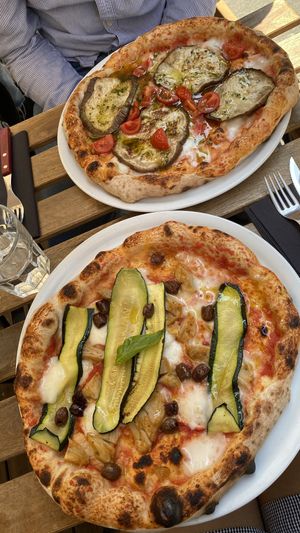 1. Aubergine, cherry tomatoes, basil oil - 2. Zucchini, vegan chicken and kalamata olives (10/10 both)  at Marcus Pizze Amore in Paris