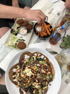 falafel (9€), fried sweet potatoe & tahini (9€), mandusalad veganised (15€)  at MaduBar in Estepona