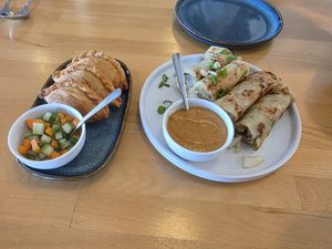 Curry puffs and Onion pancakes with peanut sauce. at Somewhere In Bangkok in Southington