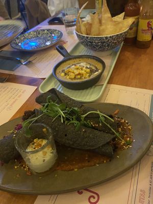 taquitos and cheezy sauce with chips  at Margo's in Queenstown