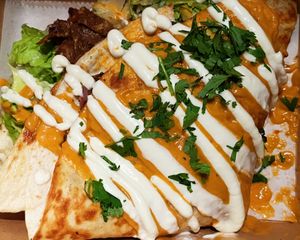 a folded carnage asada quesadilla to go at Terror Tacos in St Louis