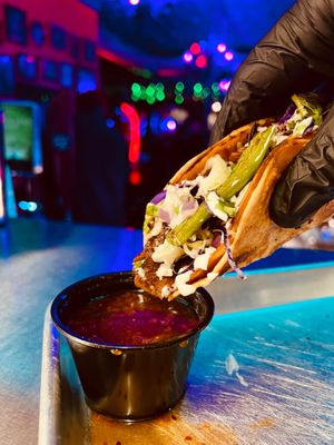 Birria Vol. 2 dipped in consommé  at Terror Tacos in St Louis