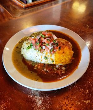 Vegan burrito with both black and pinto beans and green and red chili sauce at Golden West Cafe in Baltimore