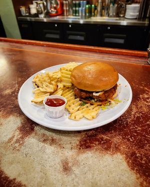 Vegan Buffalo Un-Chicken Sammy with Waffle Fries at Golden West Cafe in Baltimore