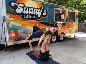 Some acroyoga while waiting for grub... at Sunny's Backyard in Austin