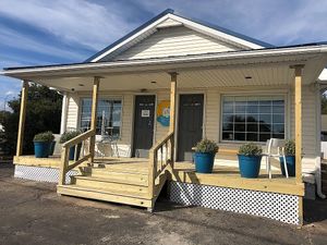 Front entrance (photo from their website) at Purr Cup Cafe in Raleigh