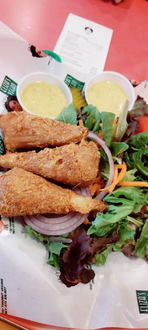 Chicken basket with salad at Eliza's Vegan Café in Florence
