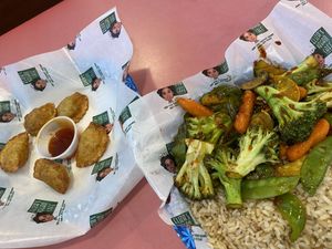 Veggie dumplings & Asian Veggies w/brown rice!👍🏼👍🏼  at Eliza's Vegan Café in Florence