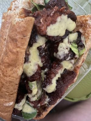 Rib sandwich with sauce   at Eliza's Vegan Café in Florence