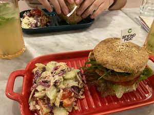 Beyond burger meal with salad  at The Cure Bali in Kuta