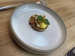 Amuse: Blini with fermented beans, butterbean cream and apple salsa.  at Kasvio in Utrecht
