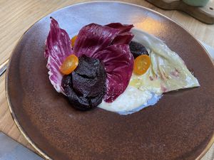 Starter: winter salad with radicchio, red beets, kumquat and silken tofu sauce. Fresh and slightly bitter. at Kasvio in Utrecht