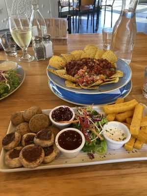 Nachos (top) and vegetarian falafel platter made vegan.Unsure if the dip on the right was even actually vegan. Staff checked and said it was, so benefit of doubt and all… but YMM at Stumpers Bar & Cafe in Hokitika