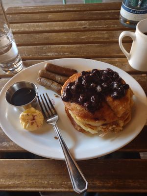 Gluten free pancakes, blueberry compote, and sausages at South x Northwest in Portland