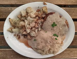 country fried steak with gravy, mashed potatoes, and sauteed cauliflower at South x Northwest in Portland